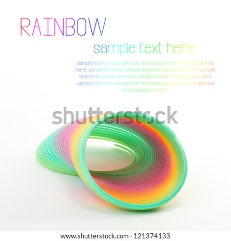 Colorful Toy Spring Rainbow On White Background
