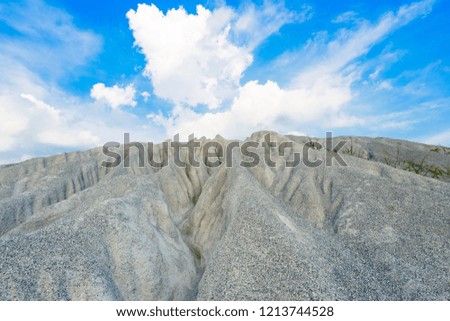 A rocky mountain or pile of fine white stone, which was mined from the mining process at "Grand Canyon Kiri" in Chonburi, Thailand. Landmark for photography