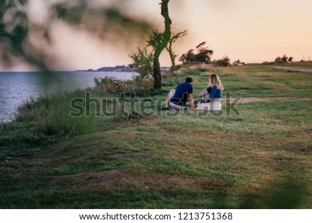 family at a picnic by the sea