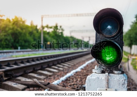 green traffic lights on the railroad Royalty-Free Stock Photo #1213752265