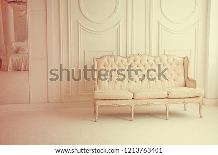 vintage filter. luxury white room. royal soft beige sofa. vintage style living room