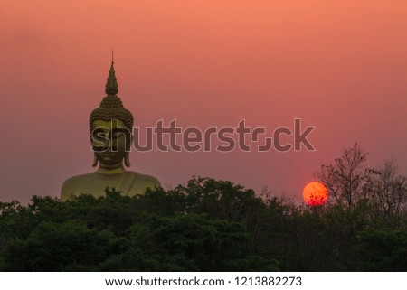 Big Buddha Statue in forest at temple In Ban Rai District,Uthai Thani Province,Thailand,Asia.