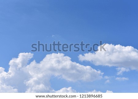 Beautiful Nature white cloud on blue sky background in daytime at summer season with copy space.
