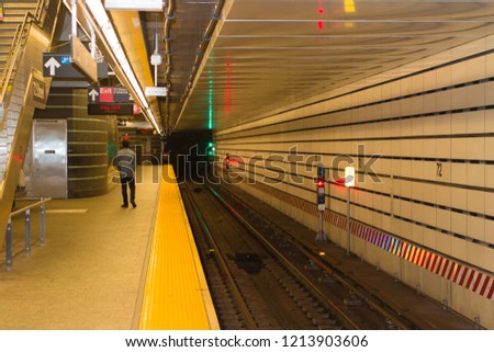 Picture of a New York City Subway system, seventy second street q train.
