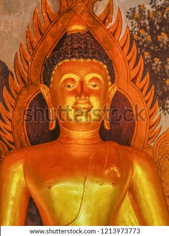 Portrait front face with half body of bronze buddha statue gilded, Chiangsaen style art 11-12th Century, Wat Phra That Doi Suthep, Chiang Mai, northern of Thailand.