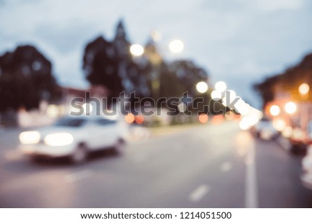 Blur traffic road with cars and other vehicle with bokeh light background.