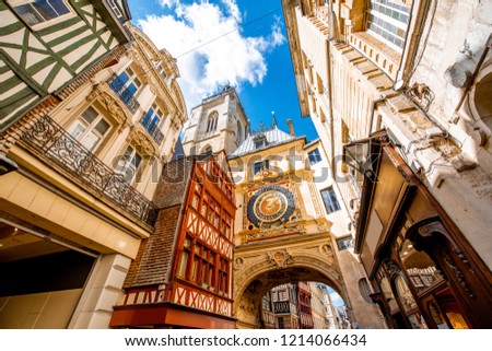 Street view with famous Great Clock astronomical clock in Rouen, the capital of Normandy region in France Royalty-Free Stock Photo #1214066434