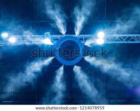 Air humidification. Industrial humidifier. Water dispersion Humidifier in the greenhouse. Royalty-Free Stock Photo #1214078959