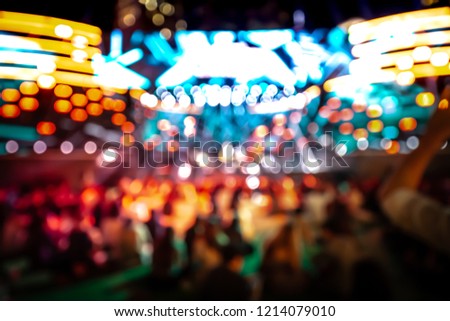 Bokeh background of people in the music show