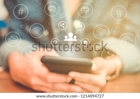 Communication fintech sign icon and connection screen of smartphone with blur cafe coffee shop background. Financial business technology freedom dream life using internet freedom life concept.