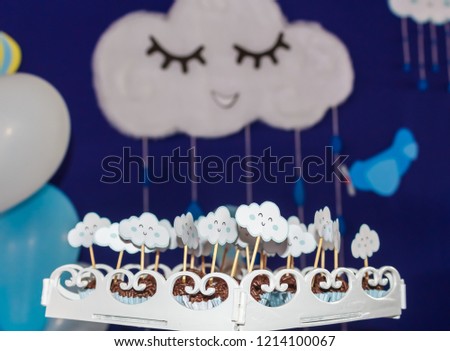 Brazilian sweet brigadeiro. Background for birthday party, with airplanes, balloons and clouds smiling in a beautiful blue sky.