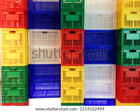 Plastic crates stacked, multi-colored
