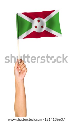 Woman's Hand waving flag of Burundi