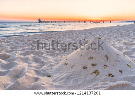 beach, pier, bridge Zinnowitz in the sunrise, Baltic Sea island Usedom Germany