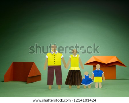 FAMILY OF FOUR IN FRONT OF THEIR HOME/HOUSE AND CAR USING THE ART OF ORIGAMI 