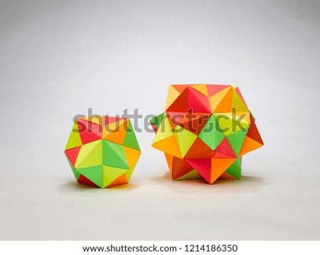 A STILL LIFE OF A MULTIPLEX BALL MADE WITH THE ART OF ORIGAMI 
