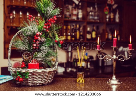 Christmas floral decoration with fir, mistletoe, and pine cones
