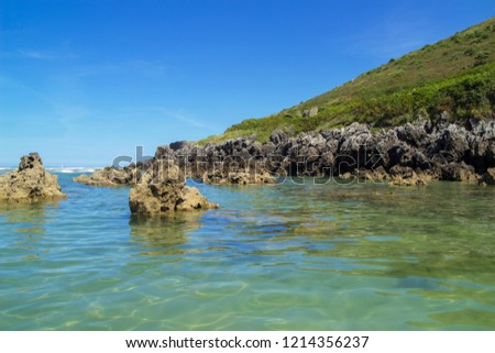 Coastal landscape of Cantabria, Playa de Arena beach close to Noja, Karst rock formations