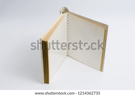 Beautiful old looking photo album on white background for your memories