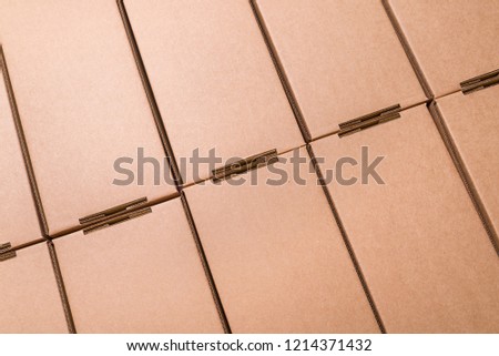 Flat cardboard boxes, textured background