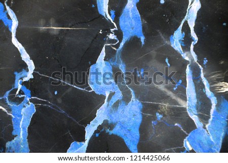 Dark blue marble texture.