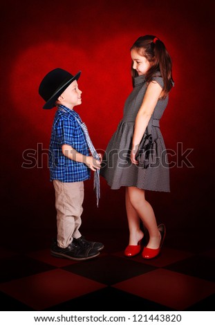 Couple in love of children on the heart valentines background