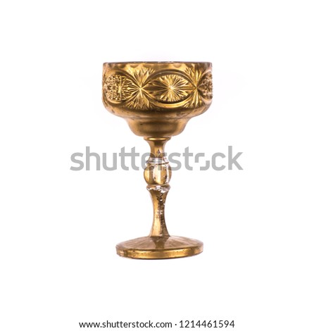 ancient gold cup for wine Royalty-Free Stock Photo #1214461594