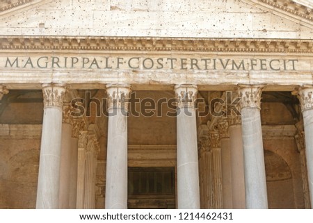 Entrance portal of the Pantheon in the sunlight. Rome, Italy. 