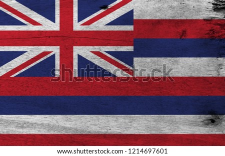 Flag of Hawaii on wooden plate background. Grunge Hawaii flag texture, The states of America. Eight stripes of white red and blue with a Union flag.