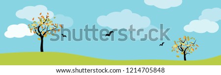 autumn landscape panorama with green meadow, trees, birds and blue cloudy sky