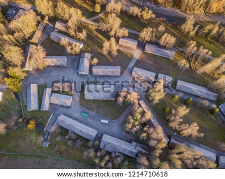 Aerial view of abandoned army baracks. Rooftop in rural area with many buildings in Switzerland, Europe