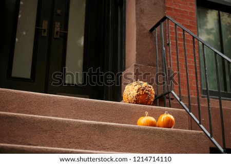 pumpkins on stoop