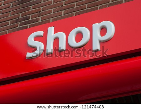 white shop word on red