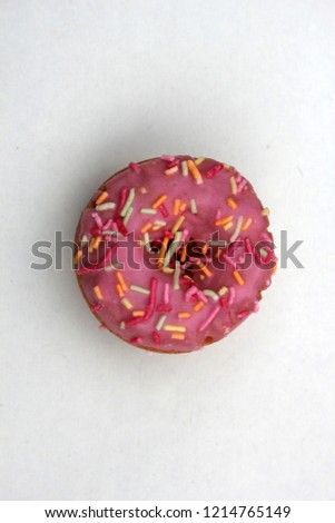 donut donuts icing sprinkles on doughnuts pink bright sugar strands background 100s and thousands decoration stock, photo, photograph, picture, image