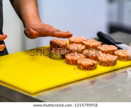 Male Chef Making Round Pork Cutlet for Some Burgers for  Wedding Meal - Kitchen Set, Isolated Action with Chef`s Hands