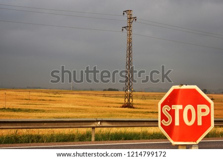 crop fields and traffic signs