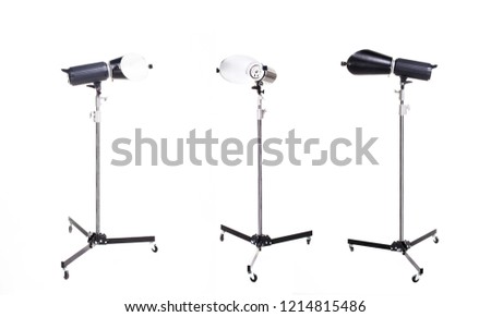 
Photographic studio light. Studio lighting equipment isolated on white background.