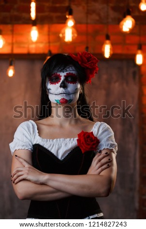 Picture of zombie woman with white make-up on face