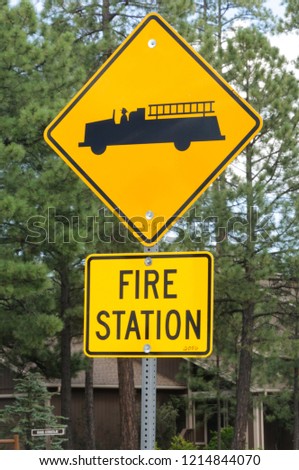 Fire Station sign with a picture of a fire engine