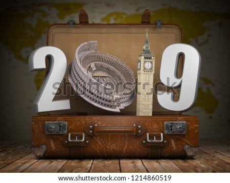 2019 Happy new year. Vintage suitcase with number 2019 as Coloisseum and Big Ben tower. Travel and tourism concept. 3d illustration