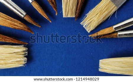 paint brushes on wooden background, beautiful photo digital picture