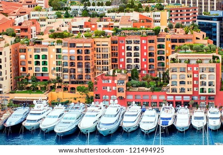 Luxury yachts in harbour of Monaco, Cote d'Azur Royalty-Free Stock Photo #121494925