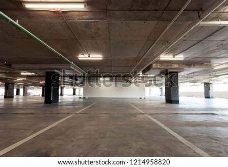 Parking garage interior, industrial building,Empty underground interior in apartment or in supermarket.