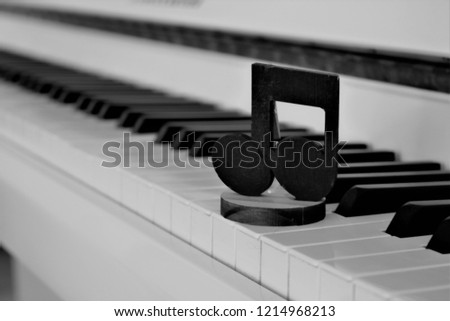 Piano with Note on Keyboard Black and White Photo Decoration