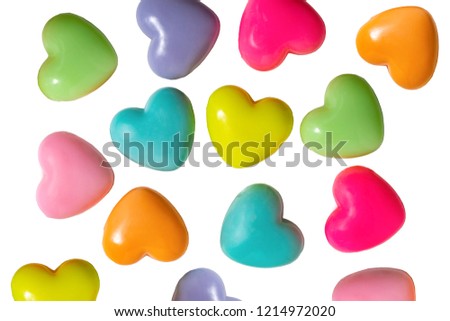 Photo frame from plastic hearts of different colors on a white background