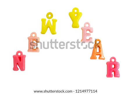 Photo word new year made from plastic letters of the English alphabet on a white background