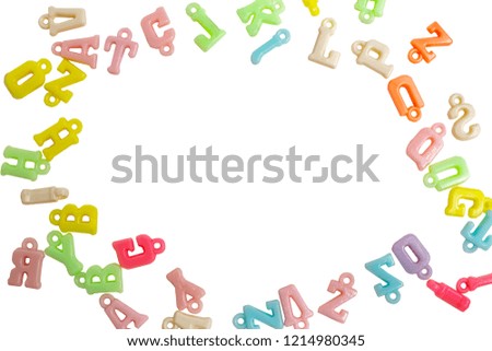 Photo frame of plastic letters of the English alphabet on a white background