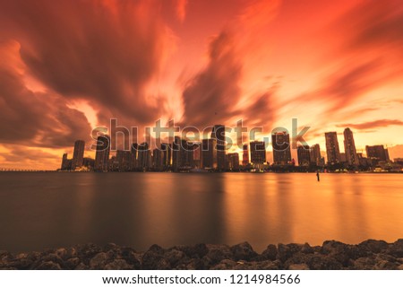 Downtown Miami Long Exposure at Twilight and Golden Hour with Traffic and dramatic sky 