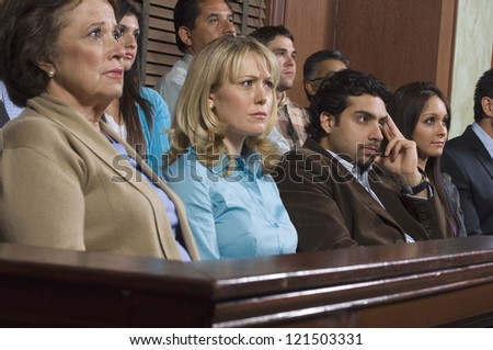 Group of multi ethnic business people sitting at court house Royalty-Free Stock Photo #121503331