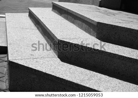 black and white photo of granite steps